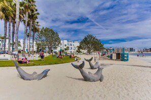 On the beach, sun-loungers, beach towels