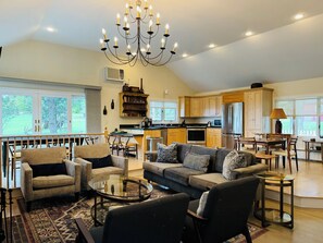 Smart TV, fireplace, books, stereo