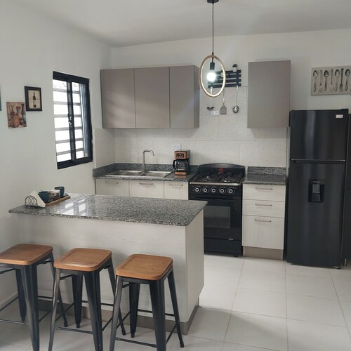 Chic 2-bedroom apartment with AC, fitness room in beautiful Santo Domingo Este