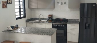 Chic 2-bedroom apartment with AC, fitness room in beautiful Santo Domingo Este