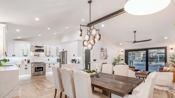 A modern kitchen with white cabinetry, stainless steel appliances, and a central island. - The Kensington| Luxe 4BR | Pool | Al-Fresco Living (Scottsdale)
