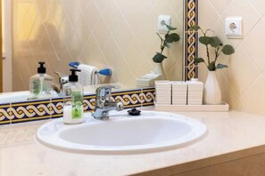 Hair dryer, bidet, towels, soap