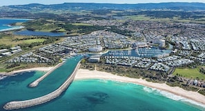 Overlooking the marina and beach, this resort offers stunning views of the surrounding waters and lush greenery.