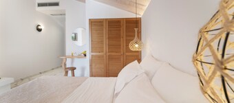 Camera 'Deluxe Loft - A' con terrazza condivisa, Wi-Fi e aria condizionata