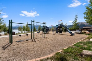 A playground with swings, slides, and climbing structures.