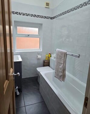 Hair dryer, towels, soap, shampoo