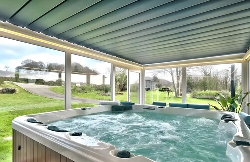 Maison "Ty Ar Dreuz" avec jacuzzi, terrasse privée, jardin et Wi-Fi