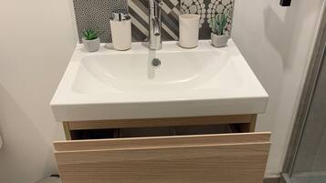 Hair dryer, towels, soap, toilet paper