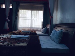 Economy Room, Balcony, Lake View | Desk, laptop workspace, bed sheets