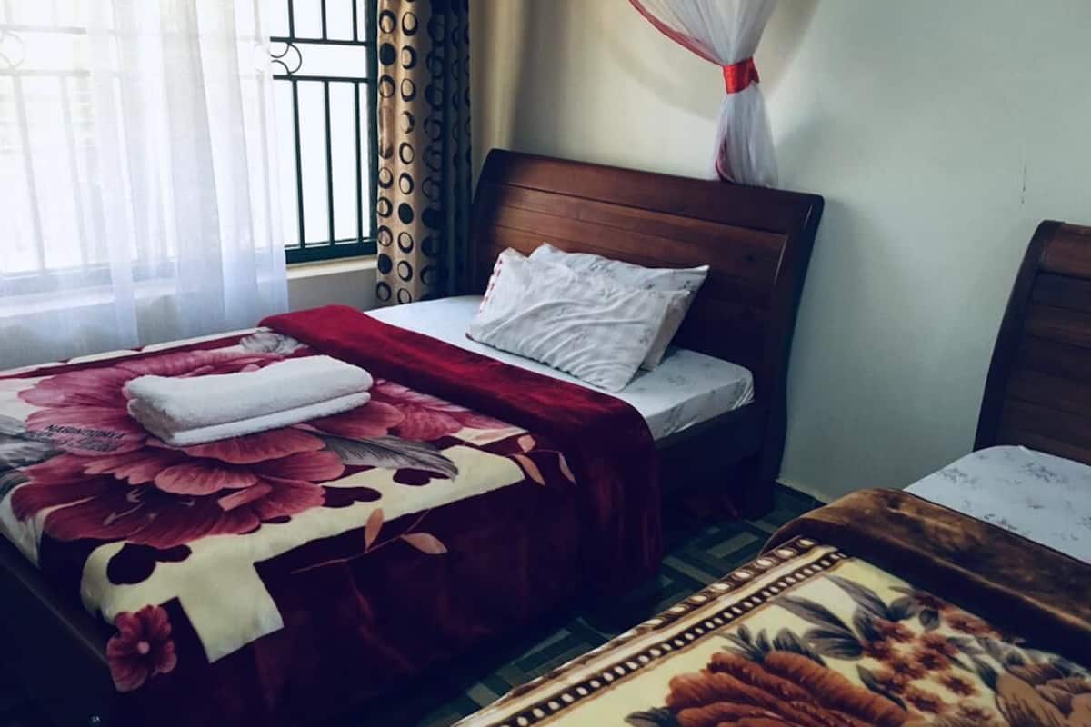 Economy Room, Balcony, Lake View | Desk, laptop workspace, bed sheets