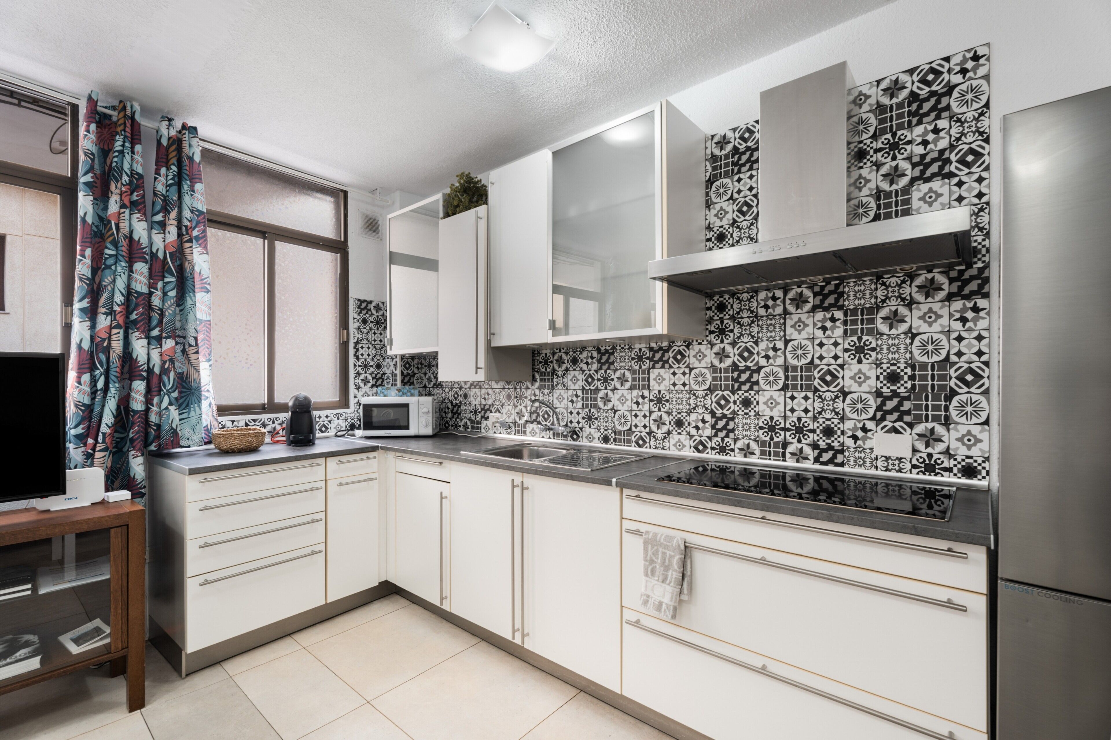 Fridge, microwave, stovetop, coffee/tea maker