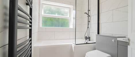Hair dryer, towels, soap, shampoo