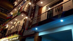 A multi-story hotel with balconies, a visible entrance, and a sign for "The Shiva Ay". - Hotel The Shivaay - Delight Inn  (Rishikesh)