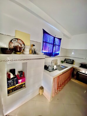 Family Apartment, Balcony, Beach View | Private kitchen | Full-size fridge, oven, dishwasher - Maison Charmante (Dar Bouazza)