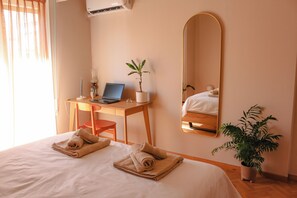 2 chambres, fer et planche à repasser, Wi-Fi, draps fournis