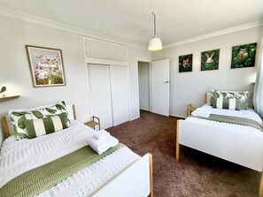 4 bedrooms, desk, iron/ironing board, travel cot