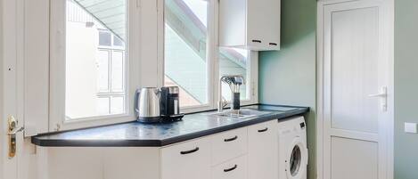 Microwave, stovetop, coffee/tea maker, electric kettle