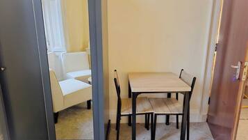 Luxury Double Room, Courtyard View | Living area | 43-inch flat-screen TV with digital channels