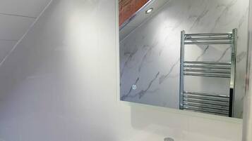 Hair dryer, bathrobes, towels, soap