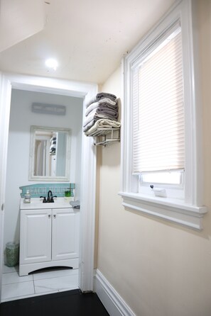 Eco-friendly toiletries, hair dryer, towels, soap