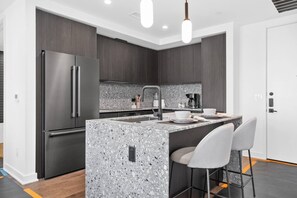 Unclassified image, 4 of 29, button - 84 East Avenue, 2303 (Austin)