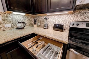 Fridge, cookware/dishes/utensils - Cedar Park Executive Stay (Cedar Park)