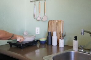 Fridge, microwave, stovetop, coffee/tea maker