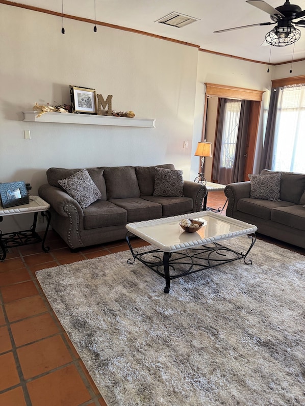 Smart TV, fireplace, table football, books