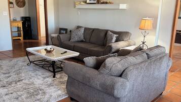 Smart TV, fireplace, table football, books