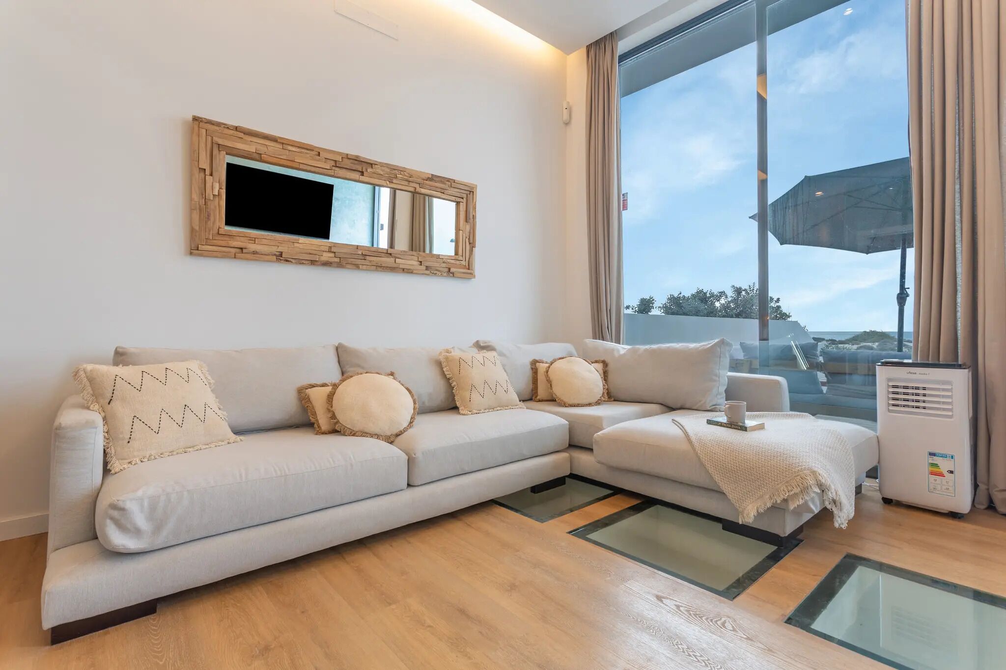 Deluxe Duplex, Ocean View | Living area | Flat-screen TV