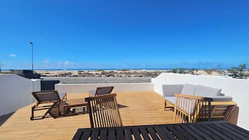 Dúplex Deluxe, vista al océano | Terraza o patio