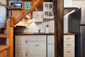 Fridge, microwave, cookware/dishes/utensils