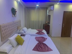 Family Triple Room | Premium bedding, pillowtop beds, in-room safe, desk