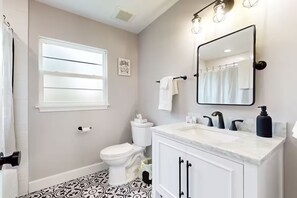 Hair dryer, towels, soap, shampoo