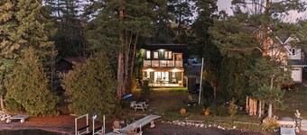 Luxury Waterfront Retreat with Sauna, EV Charger, Pizza Oven & Lake Views