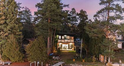 Luxury Waterfront Retreat with Sauna, EV Charger, Pizza Oven & Lake Views