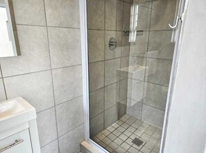 Shower, towels, soap, shampoo