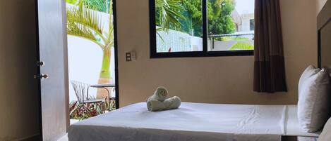 Comfort Room, 2 Double Beds, Refrigerator | Iron/ironing board, free WiFi