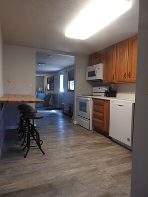 Fridge, microwave, oven, stovetop - Charming 3-bedroom house on Shell Lake! Right off the ATV / Snowmobile trails. (Shell Lake)