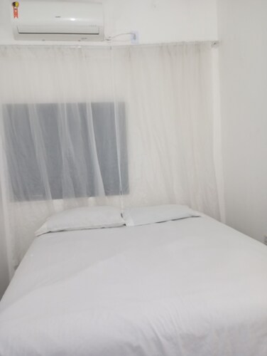 Suite Central com Garagem