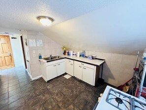 Classic-Einzelzimmer | Gemeinschaftsküche