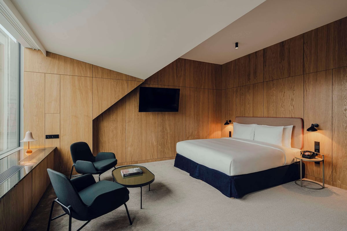 Superior Room, 1 King Bed, Non Smoking | 1 bedroom, minibar, in-room safe, individually decorated
