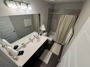 Hair dryer, towels, soap, shampoo