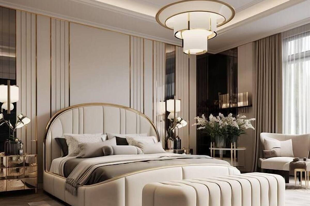 Un dormitorio moderno con una cama grande, un sillón de descanso y una araña.
