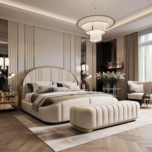 Un dormitorio moderno con una cama grande, un sillón de descanso y una araña.