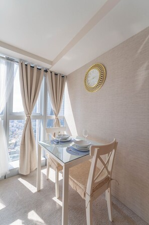 Business Apartment, City View | Living area