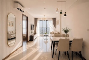 Superior Apartment, 2 Bedrooms, Kitchen, City View | Living area | 35-inch TV with cable channels - Ha Do Centrosa - Luxury Central Point (Ho Chi Minh City)