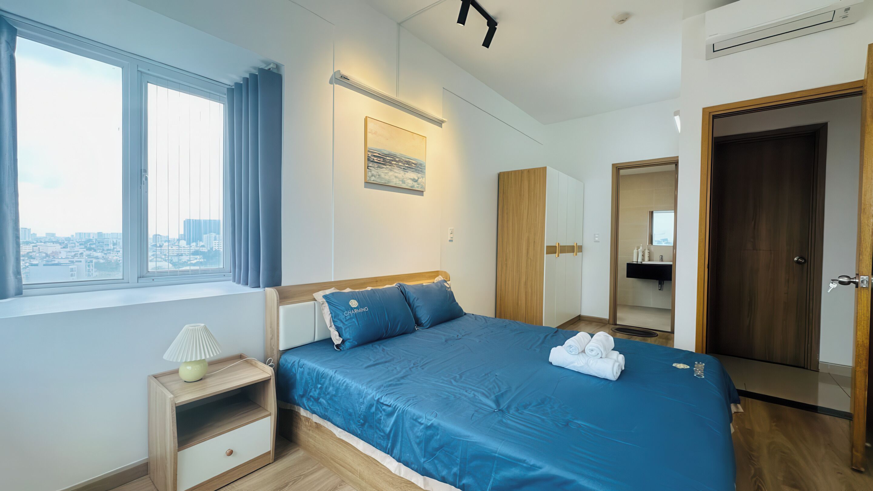 Deluxe Apartment, 2 Bedrooms, Kitchen, City View | Minibar, desk, laptop workspace, iron/ironing board