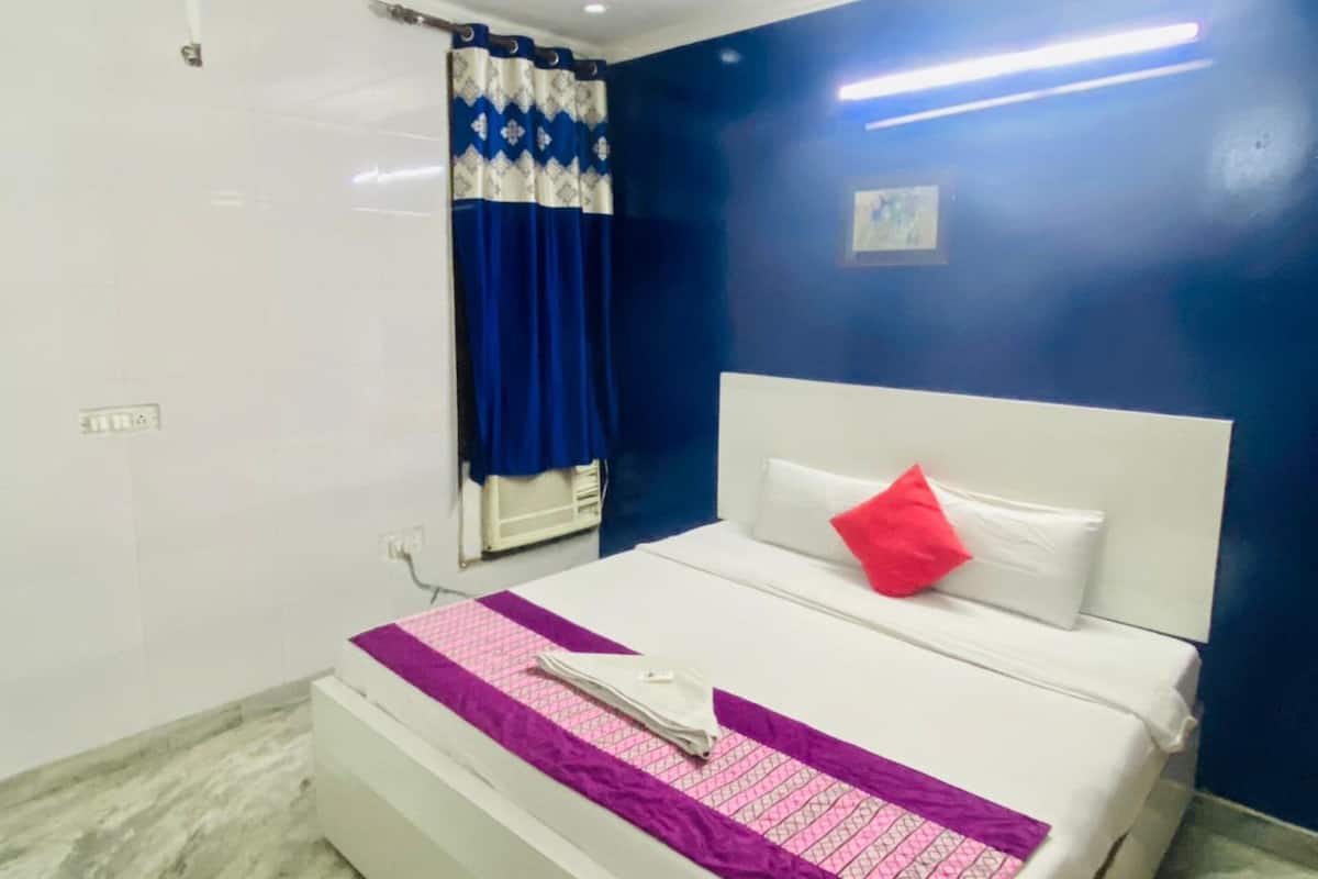 Habitación doble Deluxe, varias habitaciones, vista a la ciudad | Wifi gratis y ropa de cama
