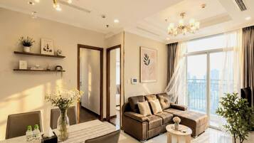 Superior Apartment, 2 Bedrooms, Kitchen, City View | Living area | 35-inch TV with cable channels